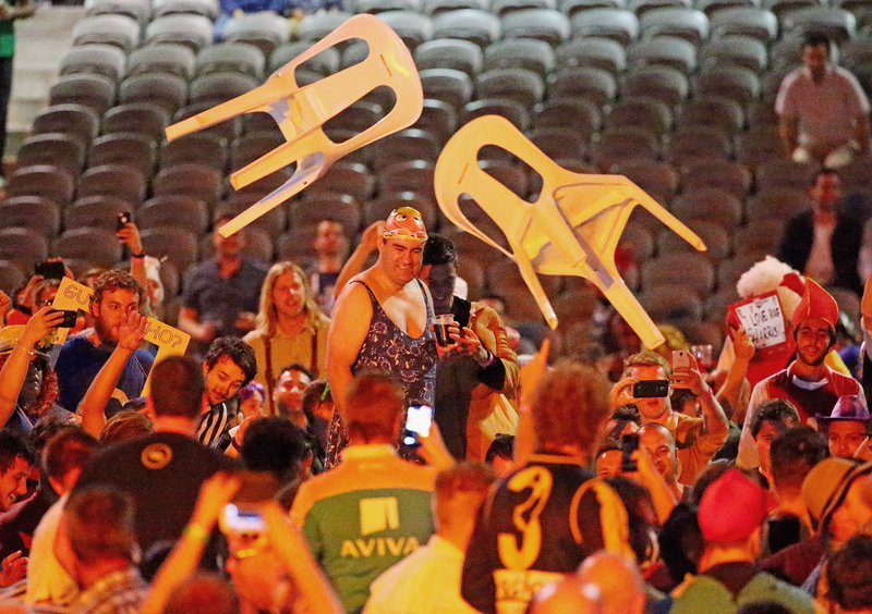 Illustration for article titled Rioting Costumed Fans Halt Australian Darts Competition